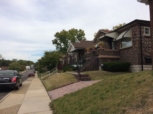 Ferguson surprised me with cute houses and a decent, but narrow, sidewalk. The only issue is many people park on the curb.