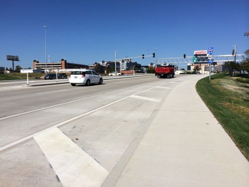 Excessive road width, as wide as the sidewalk, is just painted