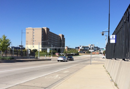 The new-ish viaduct over the railroad tracks doesn't have unused roadway. Yes, there's a bus stop here sand it gets used.  