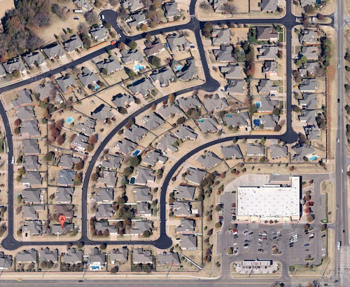 My brother's house is so close to a large grocery store, but you can't walk there. Source: Google maps