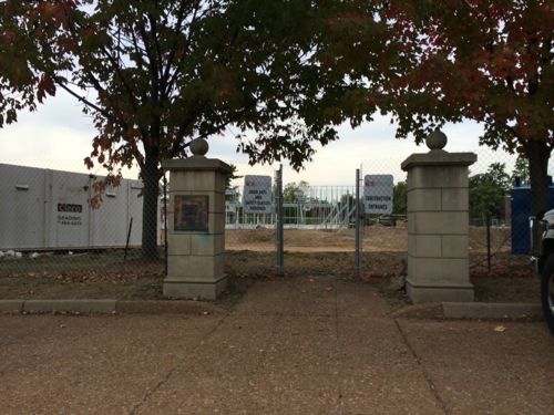 Construction of the building in Powell Park, seen from the far end of the station's park-n-ride lot