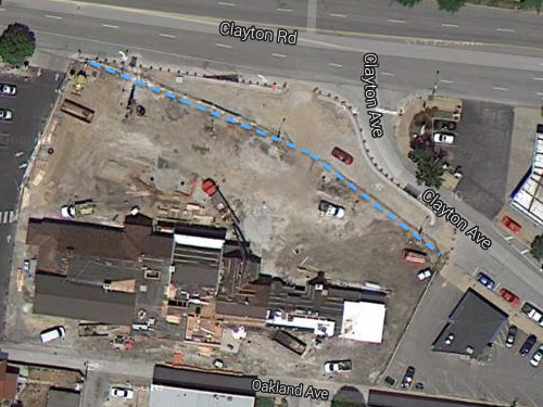 The dashed blue line shows the curb line that existed for decades.  The new configuration puts these two perpendicular to each other.  Click image to view map