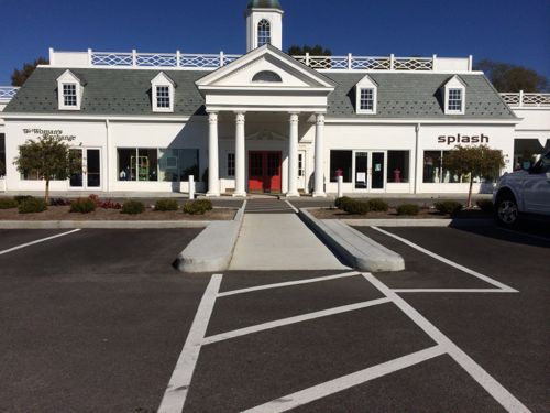 A pedestrian route leads to a space formerly occupied by Lammert's Furniture