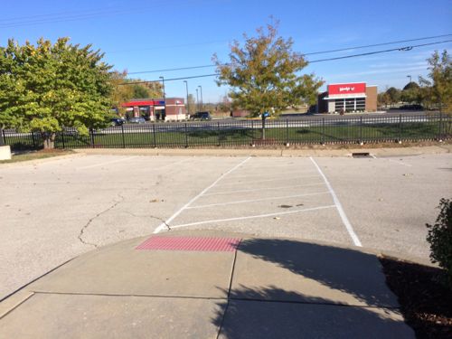 There's a ramp & crosswalk out to the sidewalk that connects to other development, but no ramp to access it. 