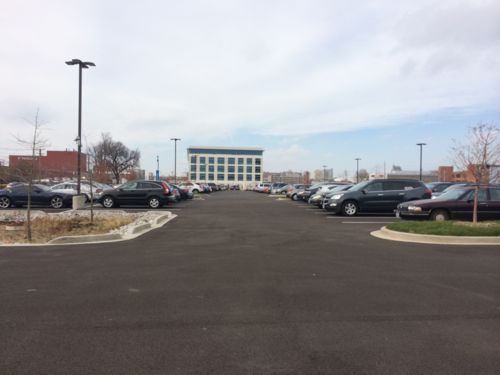 Looking west through new surface parking lot