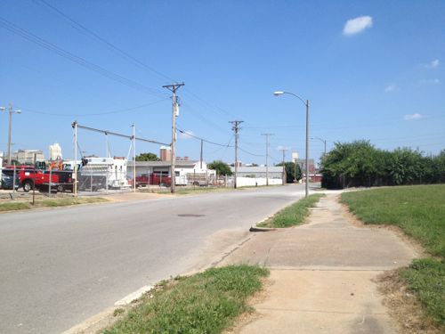 Looking east from in front of the grain silo toward the future IKEA. A sidewalk exists currently.