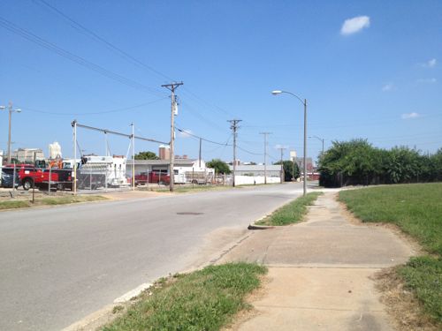 Looking east from in front of the grain silo toward the future IKEA. A sidewalk exists currently. 