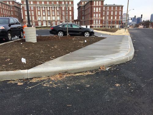 The non-ADA walkway seen from the driveway looking back toward 14th & Lafayette