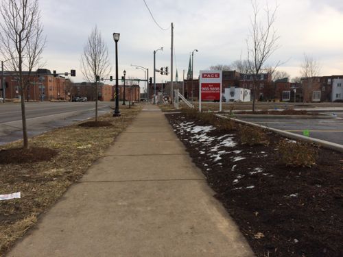 The able-bodied not pushing a stroller or walking with a small child and approaching from the west will likely but through the parking lot (right) rather than use the walkway where the red sign is located.