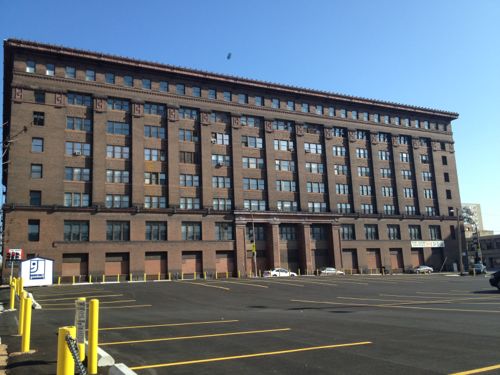 The west facade facing 18th is the tallest due ti the grade change. 