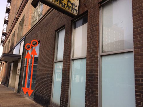 To the east of the 50s entry you can see where two brick columns were removed to create a storefront.