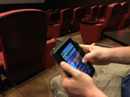 My boyfriend ordering our food & drinks via tablet at our comfortable seats.