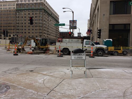 Crosswalk across Olive blocked at Tucker, sign placed as required. 