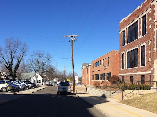 Looking west on College, the church-owned lot on the left wasn't full at 9:15am last Thursday morning 