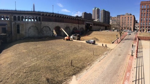 The planned park space is to the right of the trucks parked in the alley, click for larger image.