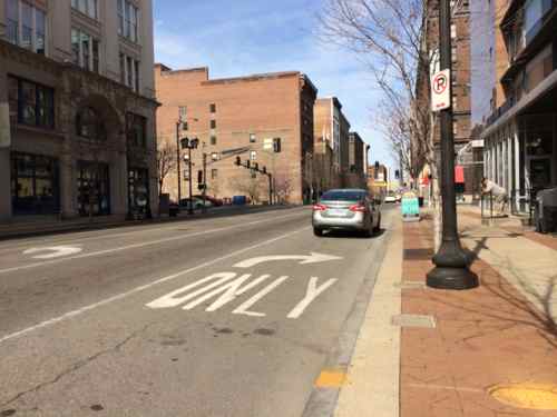 Occasionally a car or two will park illegally in the block-long turn lane. 