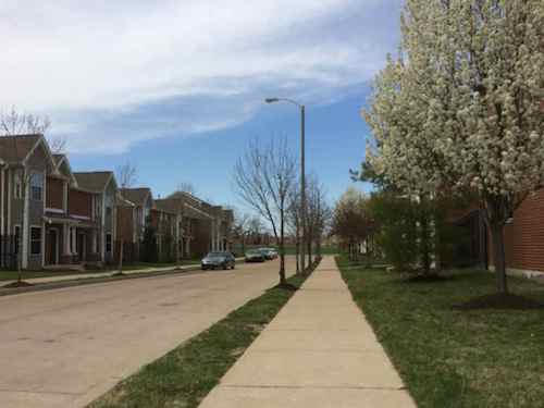 Most streets perpendicular to 9th/10th have a nice neighborhood scale. This is  New Haven Ct.