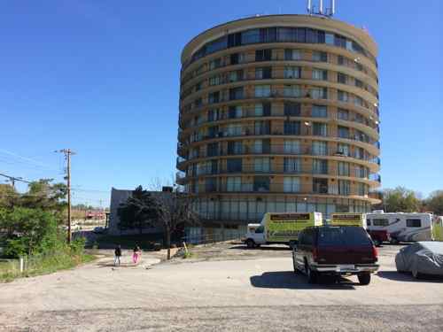 Looking north toward the tower, the parking lot goes down to reveal the lower level that faces west