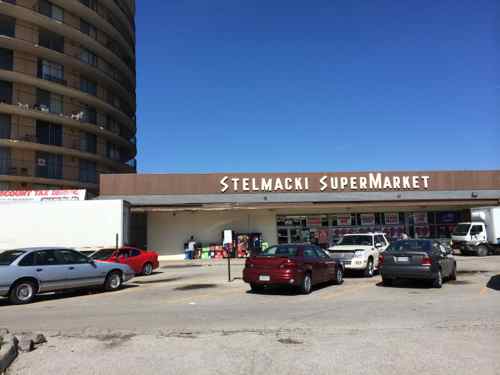 A one-story commercial center faces Lewis & Clark Blvd (367)