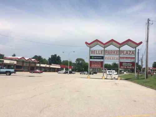 The now-dated Belle Parke Plaza strip mall was built in 1963 to serve the new residents 