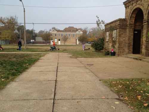 The vacant commercial building in the background on November, 2011 