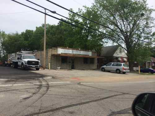 The commercial building a block east, at 10236 Lockland, was built in 1936. I don't know the prior uses, my guess was a market. 