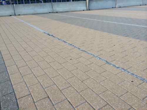 It has failed throughout the plaza, plus the Jersey barriers along Clark are tacky!