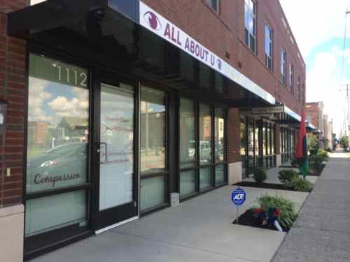 Some of the original live/work units have businesses in them. Not a busy retail street, but a start. The new building on the west side of Sarah also features live/work units.