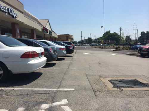 I had to roll behind 13 parking spaces to reach a ramp, one car nearly backed into me.