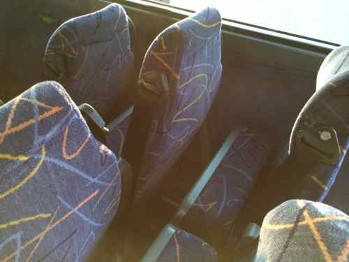 Like Greyhound, their buses have a section where two rows of seats slide to make room for a chair. They can't sell 3 seats as a result. 