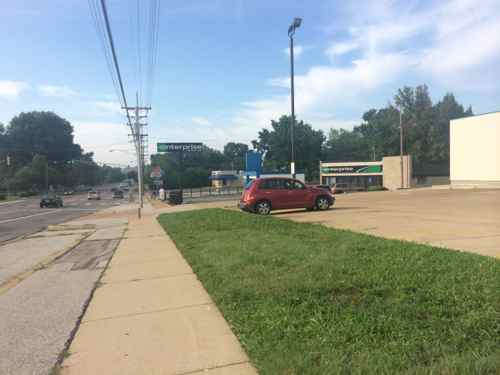 The grass between the sidewalk and parking lot is a welcomed relief from all the paving 