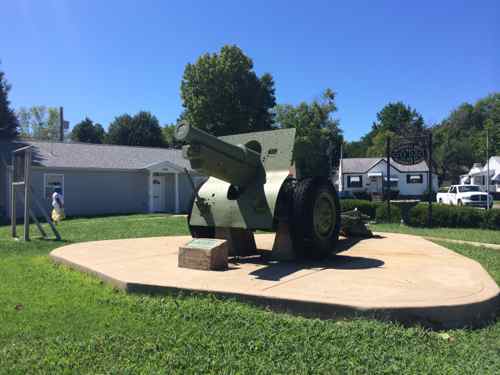 The Flordell Hills city hall is the building on the left. The cannon isn't militarization, it's a WWII memorial. 