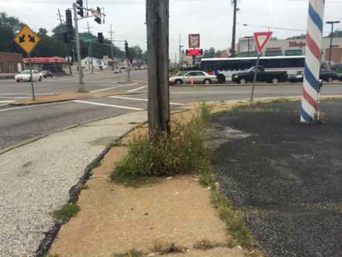 This image sums up how pedestrians are treated, The bus in the background is heading WB on Chambers. 