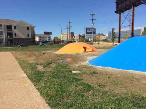The colorful mounds will be great for kids once not surrounded by standing water & mud  