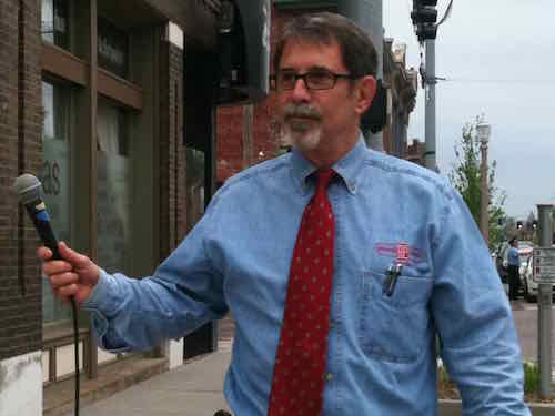 As a long time business owner, Dave Renard was one of the speakers. The ribbon cutting couldn't be held next to his business because the long blank wall wasn't the vibrant message being portrayed this day. 