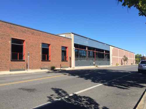 The street facade on the east end of the 1990 warehouse was opened up