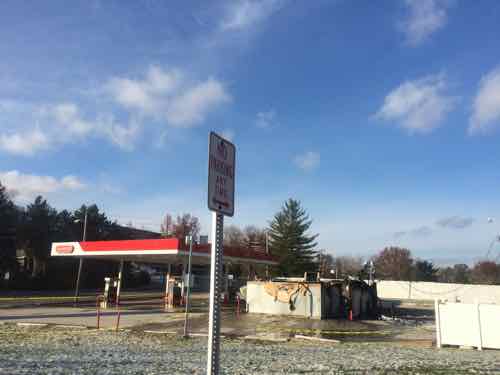 I don't seem to have a good before of the Conoco station at 10280 W. Florissant, just north of the car lot.