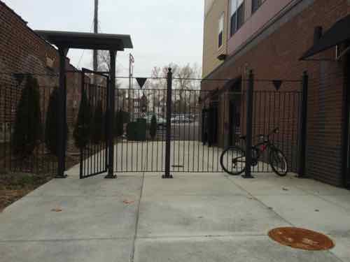 The entrance for the upstairs apartments ids located on the West end of the building. 