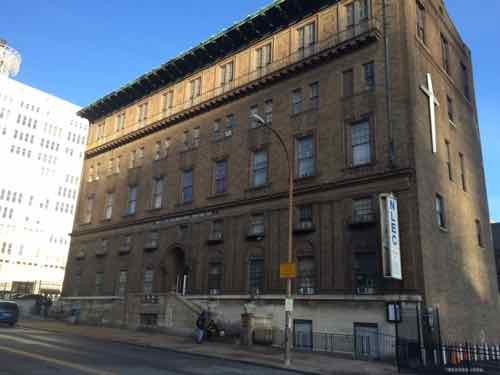 Originally built as a YWCA, this building on Locust has been the home to the New Life Evangelistic Center since 1976. Some say it should be razed, but that's a short-sided view. 