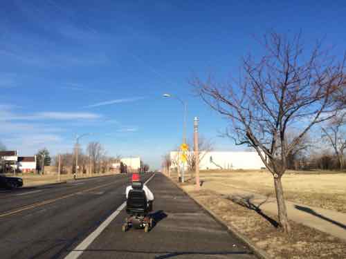 I was driving this day but I'm usually in a wheelchair, I first saw this man East of Jefferson and now he's almost to Cardinal. He's in the street because the new ramps have those huge gaps that can't be crossed until filled with asphalt. 