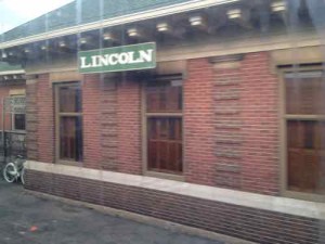 The Lincoln IL Amtrak station, as seen from a Lincoln Service train in May 2012 