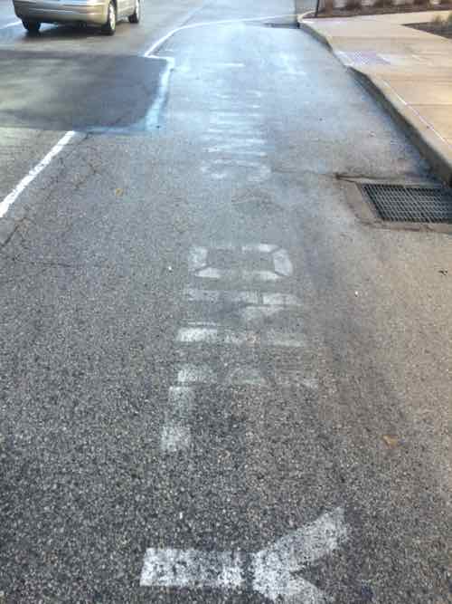 A close up of the fading text, but the solid white line and ramp are pretty clear.