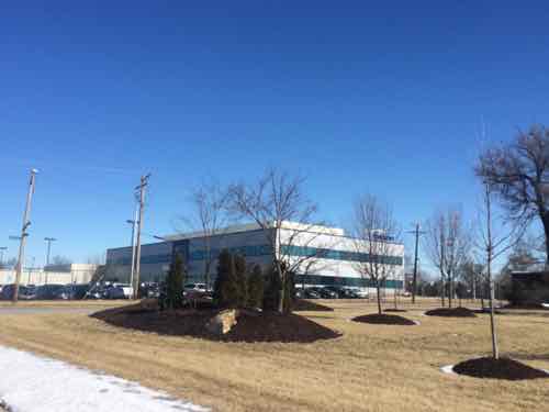 Looking NE from Elliot Ave between N. Market & Benton. The company has removed public sidewalks from the public-right-of-way adjacent to their facility. 