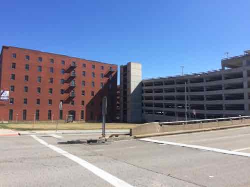 Looking into the site, the 11th Street exit from I-64 ids on the right