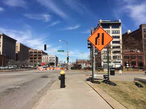The 3rd sign that was always on the grass --likely because they didn't want to cover/block the fire hydrant.