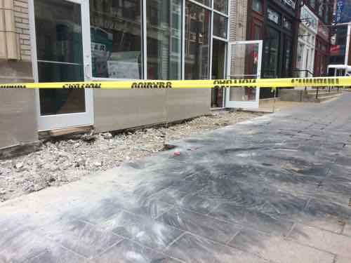 January 22nd; Old ramp and sidewalk between doors now removed