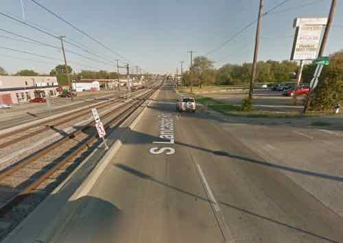 This view from Google Street View shows how traffic & pedestrians from a side street are forded to turn right. Click image to view the location on a map