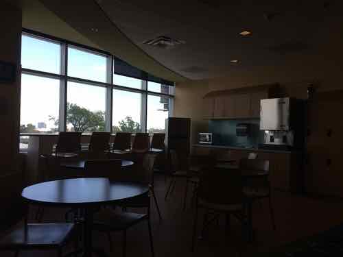 A family lounge on the 3rd floor with windows facing East toward downtown 