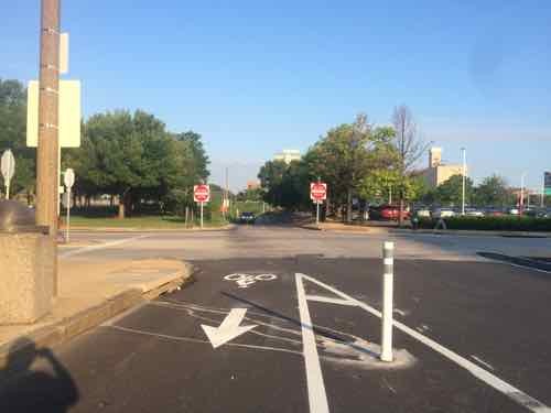 Looking West we see the I-64 off-ramp. A dashed line would help guide motorists to the left 