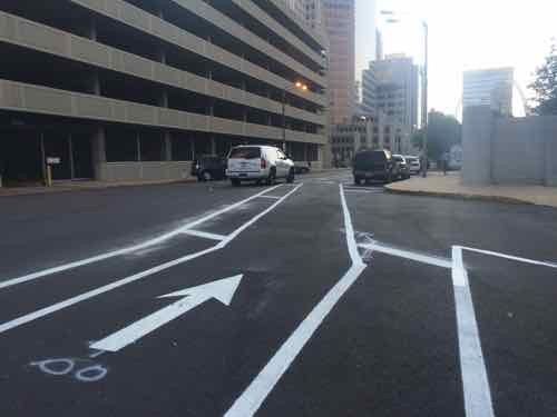 This is probably the single most controversial part of the route, the second half of this block has a conventional exposed bike lane.. 